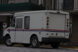 white postal service truck