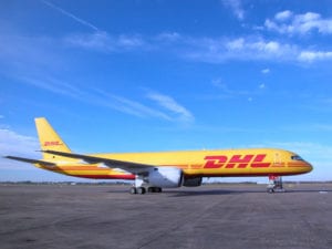 DHL aircraft on the floor with blue sky at the back