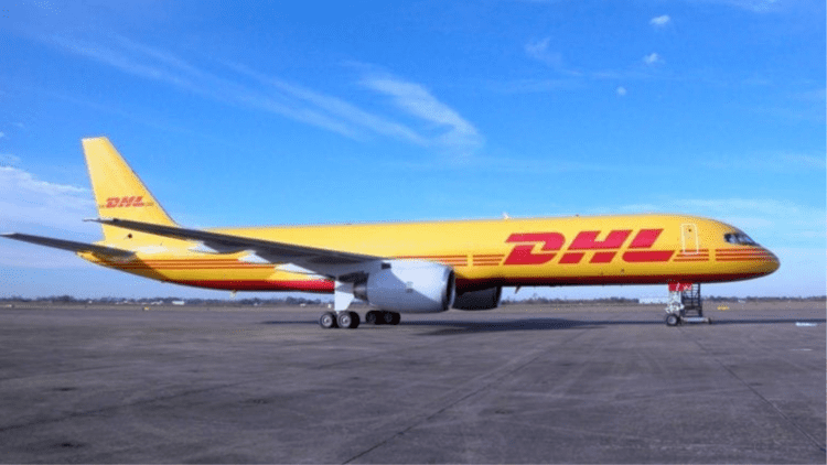 DHL aircraft on the floor with blue sky at the back
